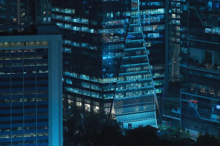 Timelapse of buildings in a metropolis at night