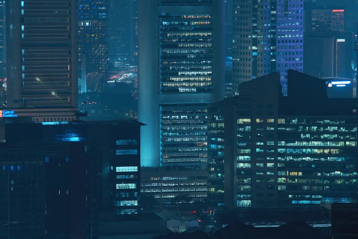 Time lapse of lights going on and off in the city at night
