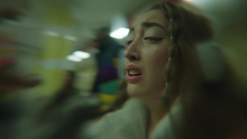 Portrait of a young woman screaming