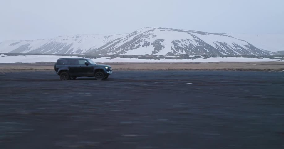 A car moving on the road during the day