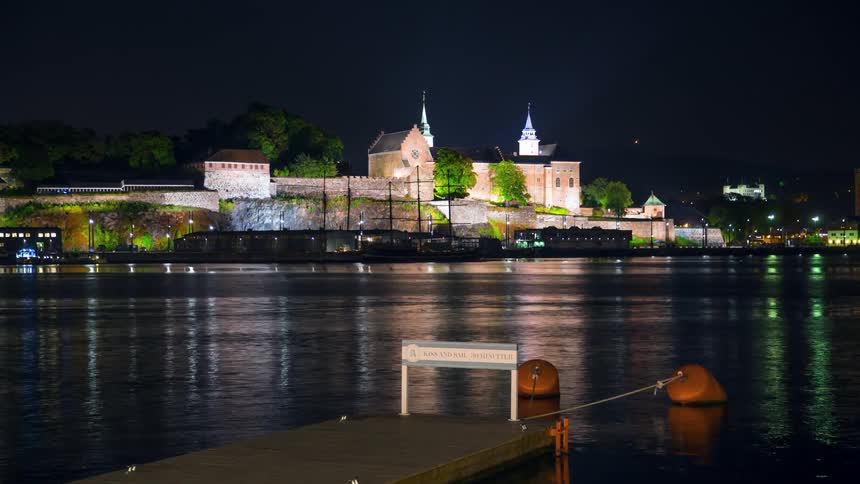 A castle sits by the river