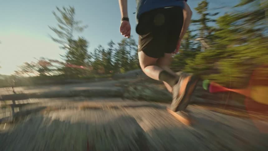 A man running through the woods