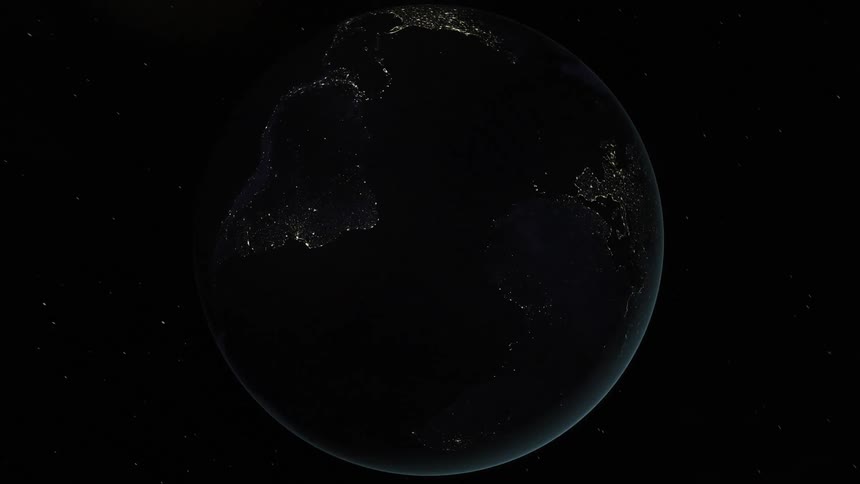 Planet earth rotating and being illuminated by sunlight in space