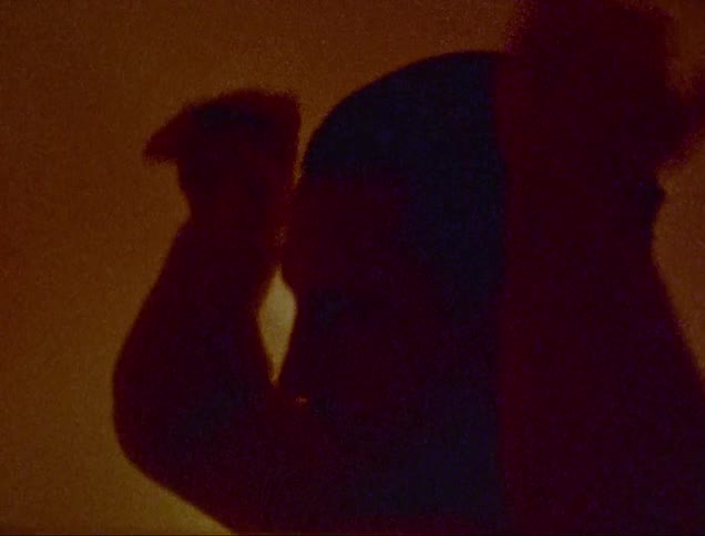 Close up of a man combing his hair