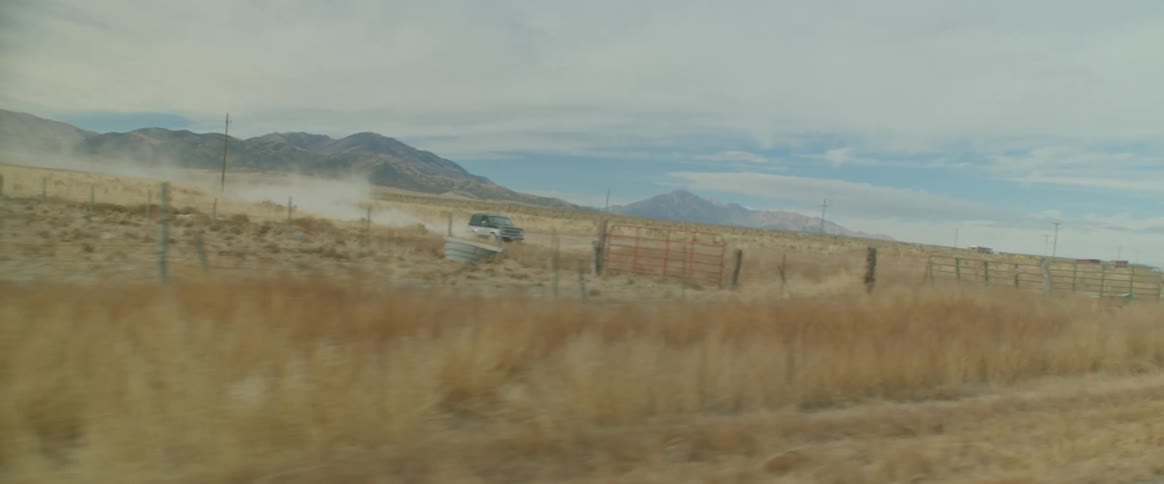 A car driving on the grass land
