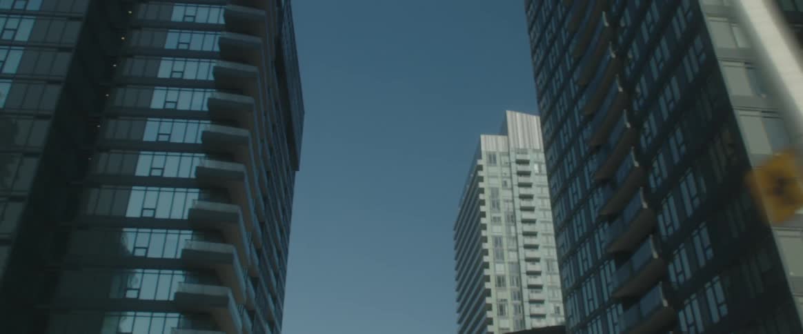 Skyline of buildings and skyscrapers reflecting sunlight