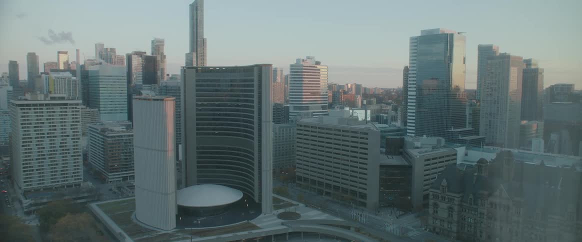 Skyline of a big city with skyscrapers during sunset