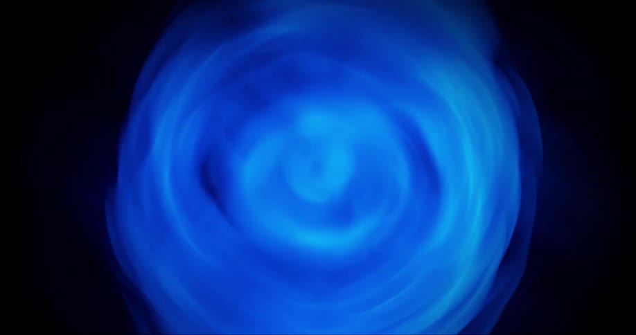 A bright blue object moving quickly in a circular shape