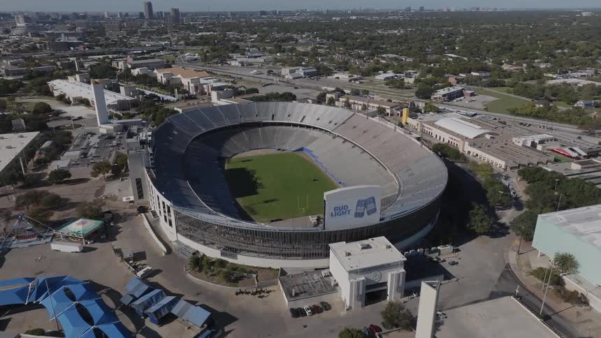 Aerial panorama of a football stadium in the middle of a city