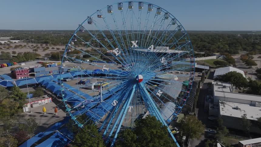 Aerial view of a blue ferris wheel