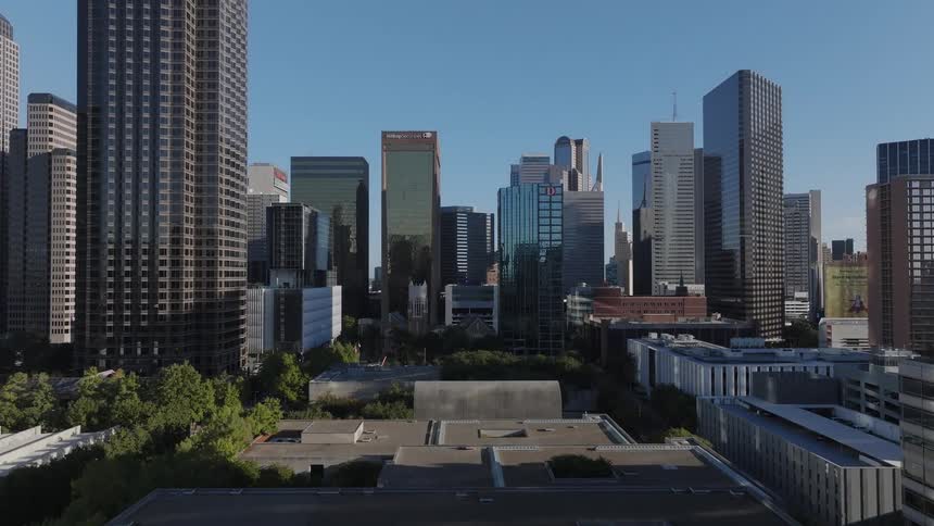 Skyline of a city with towers and skyscrapers during the hot day
