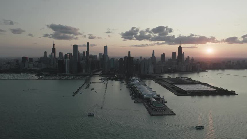 Aerial of a marina in the big city during dawn