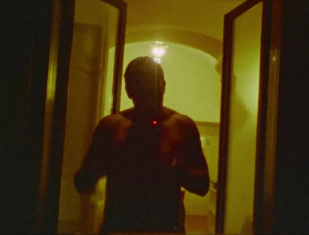 Man smoking at home caught on vintage film