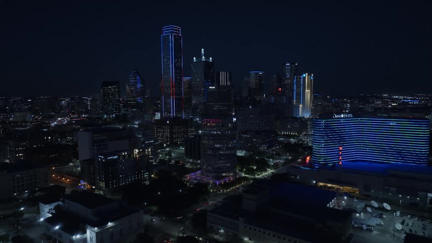 Landscape of buildings and skyscrapers in a metropolitan area at night