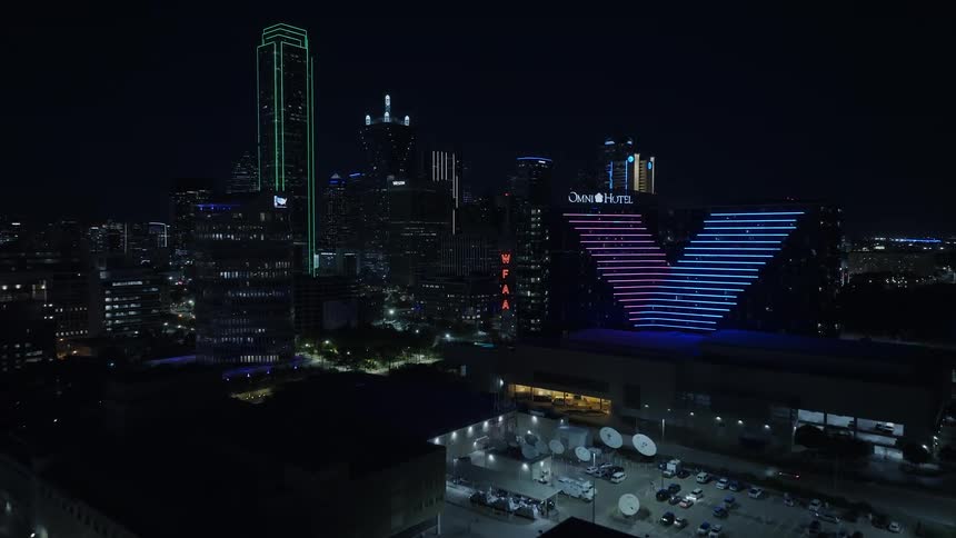 The city is brightly lit at night