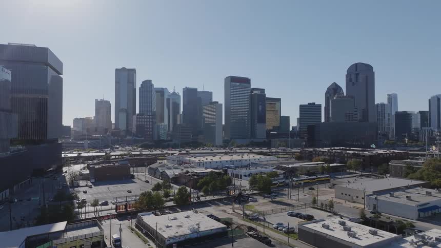 A city with huge buildings and in front there are lowrise residential areas
