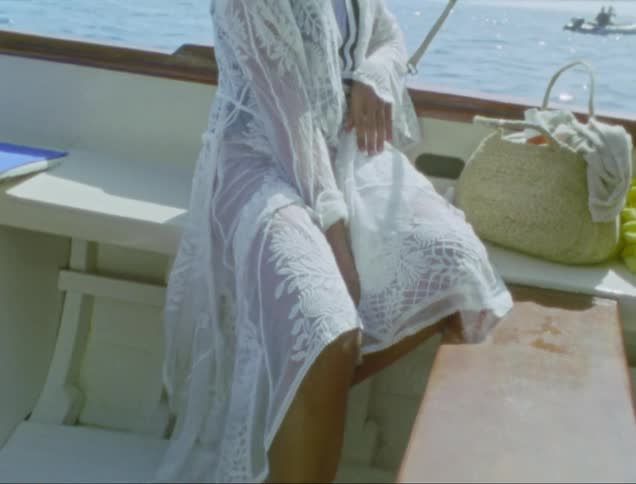 A woman is riding on the boat