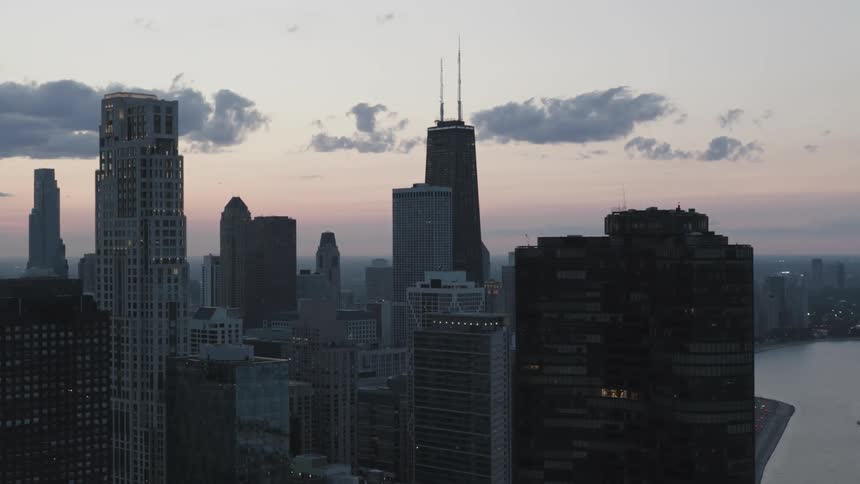 An aerial view of a metropolis filled with skyscrapers