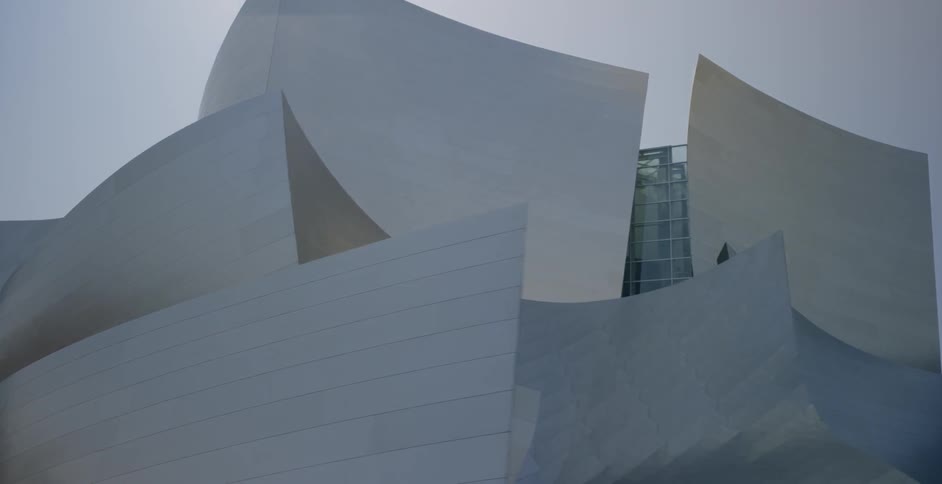 Shiny metal surfaces reflect the light under a cloudy sky