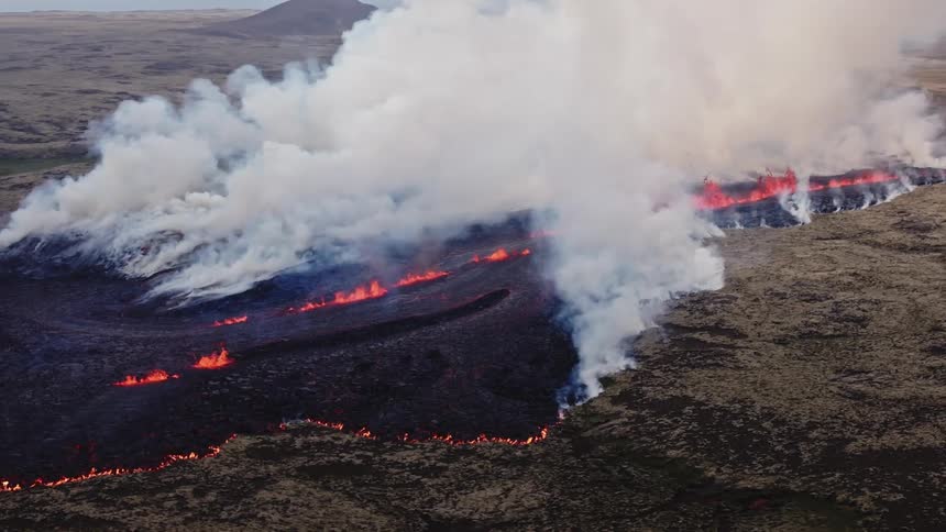 Aerial view of a volcanic eruption in the plains