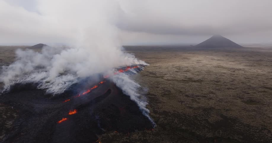 Aerial view of a volcanic eruption on the plains