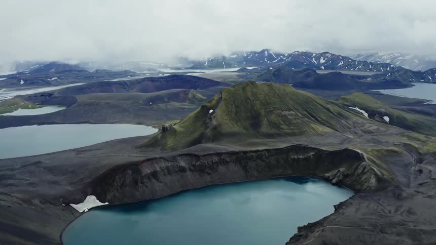 A blue lake in a crater in the desert