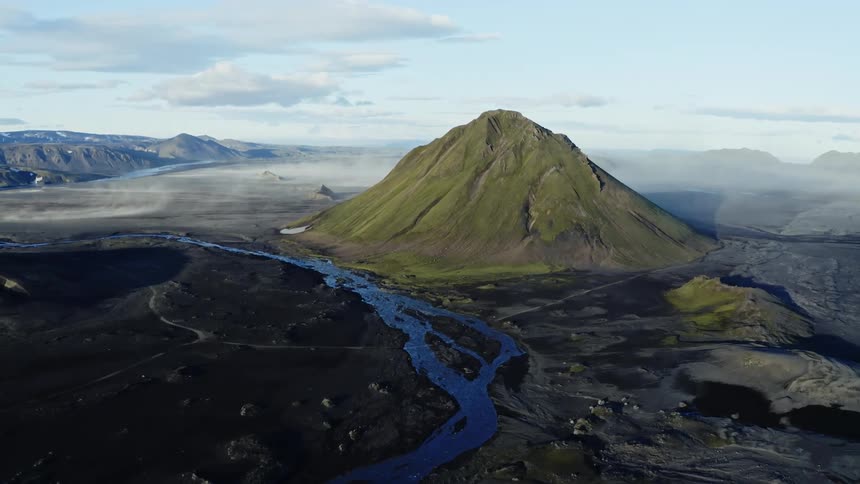 Aerial of the mountain with stream during the day