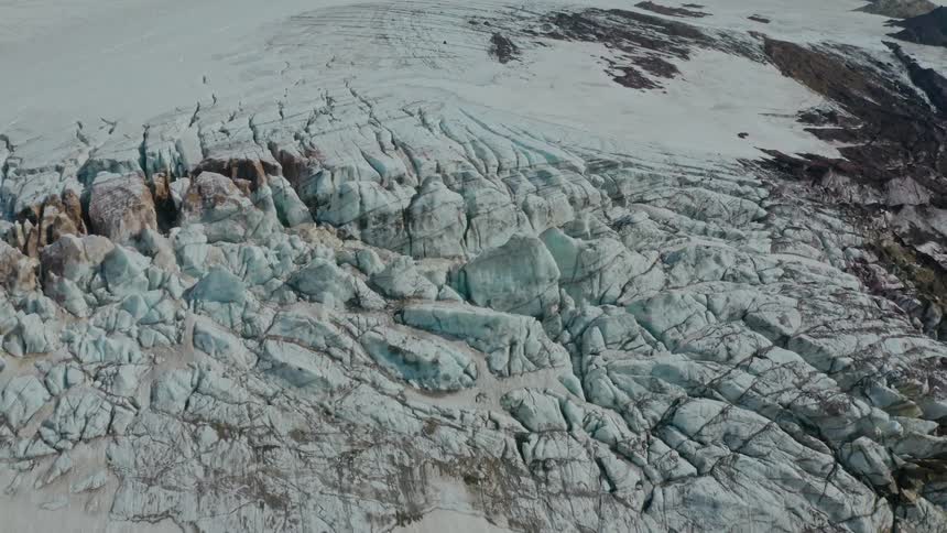 Aerial of frozen mountain range during winter