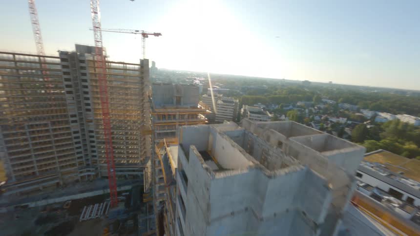 Buildings in the midst of a city under construction
