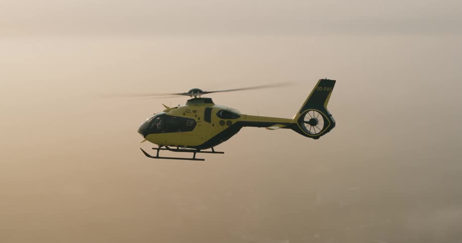 Helicopter flying in the sky during the day