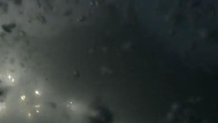 The water is rough and bubbling going under