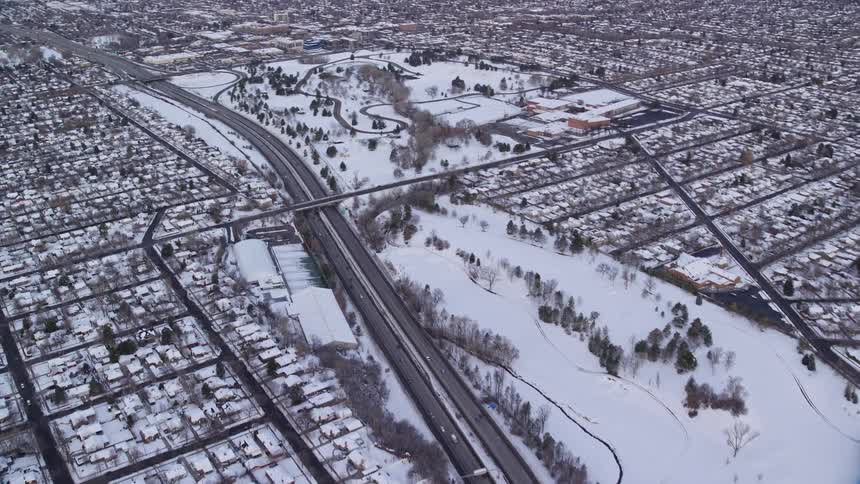 Aerial view of houses covered in snow