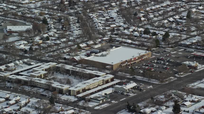 A city suburb with small houses and a snowy environment