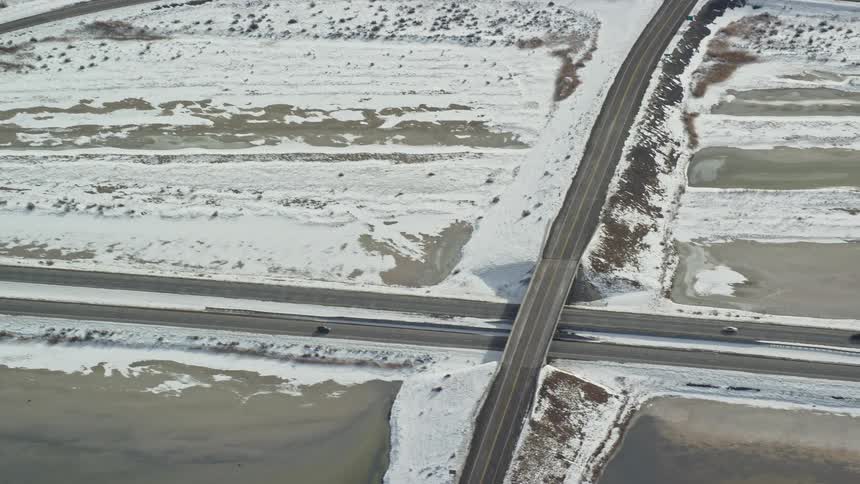 Aerial view of roads through snowcovered landscapes