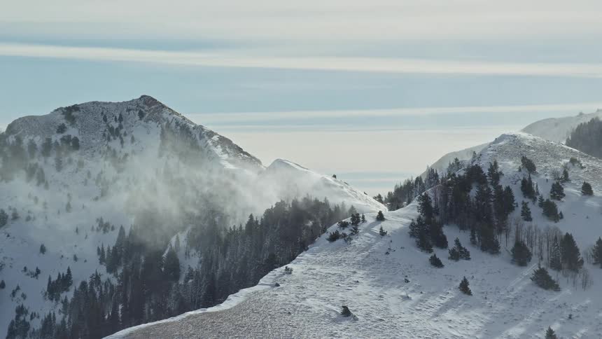 The mountain is covered with snow as result to the winter season