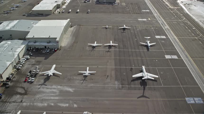Aerial view of parked airplanes at an airport