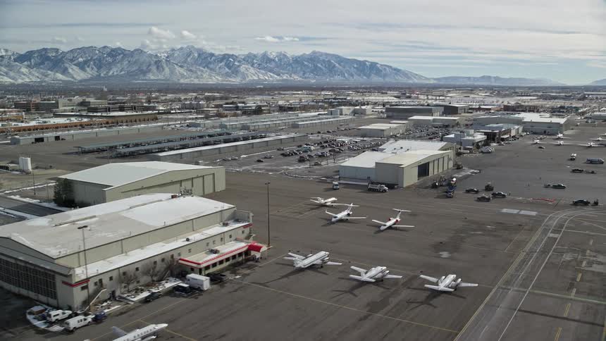 Skyline of an airport with planes near the runway