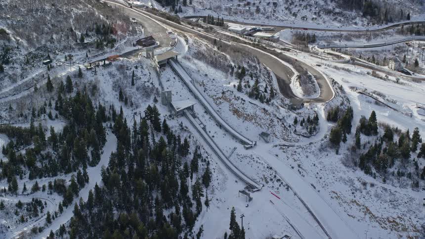 Aerial of a snowboarding slope on a mountain during winter