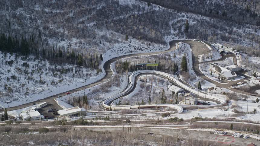 Aerial of a ski slope on a hill during winter