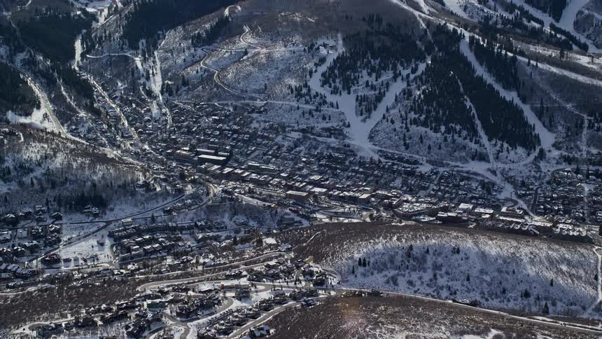 Aerial view of a residential area in snowy valley