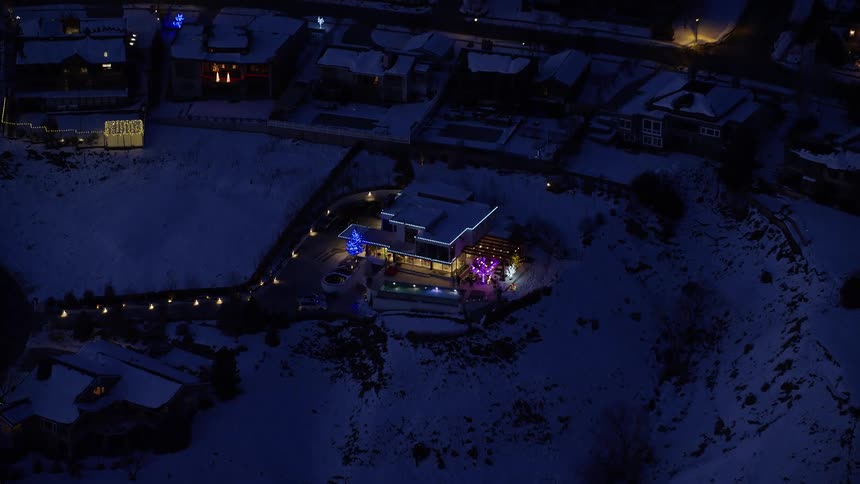 Christmas decorations are lit on the home