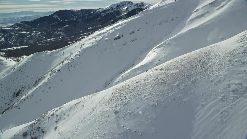 Aerial view of snowy mountain slope