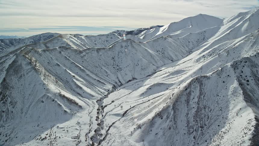 Aerial view of a snow covered mountain range