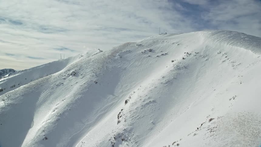 Aerial view of snowy mountain slope