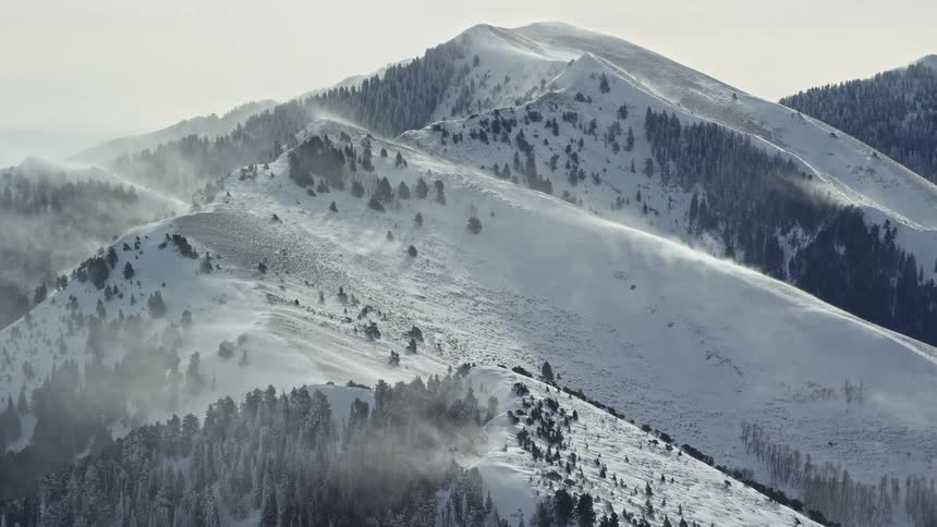 Aerial view of snow covered mountain tops