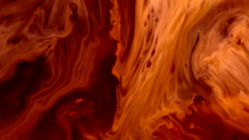 Macro view of abstract flowing brown inks