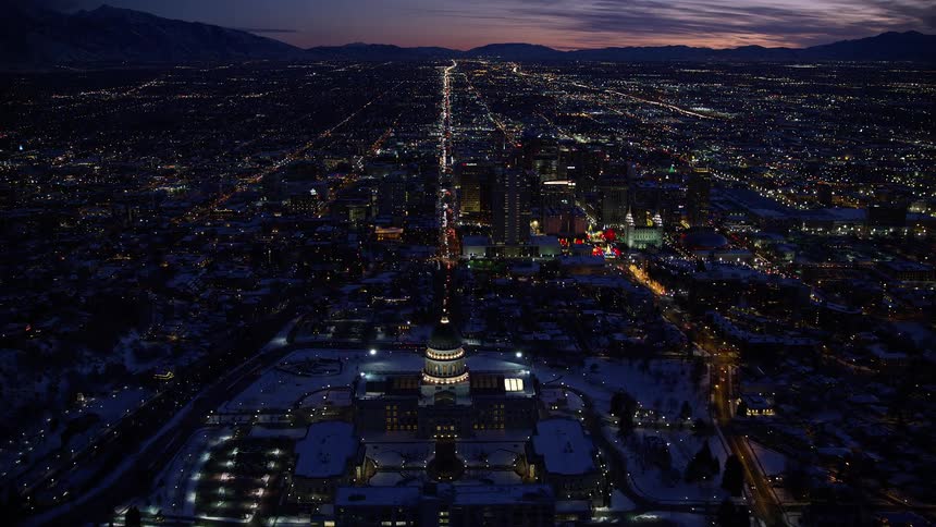 Aerial view of a snowcovered metropolis at night