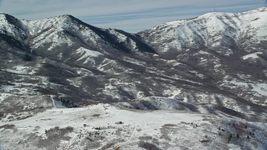 Panorama of a mountain range covered in snow