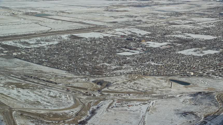 Aerial of a small town covered in snow during winter