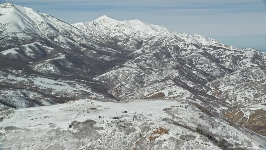 Chain of mountains and peaks covered in snow